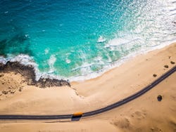 Bus driving along Lanzarote's coastline